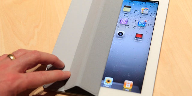 March 2: The iPad 2 with a Smart Cover is shown in use in the demonstration area after the iPad 2 launch during an Apple event in San Francisco, Calif.