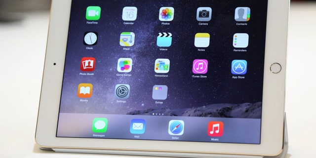 A new iPad is seen follownig a presentation at Apple headquarters in Cupertino, California Oct.16, 2014.