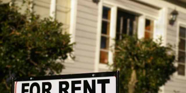 House with "For Rent" sign