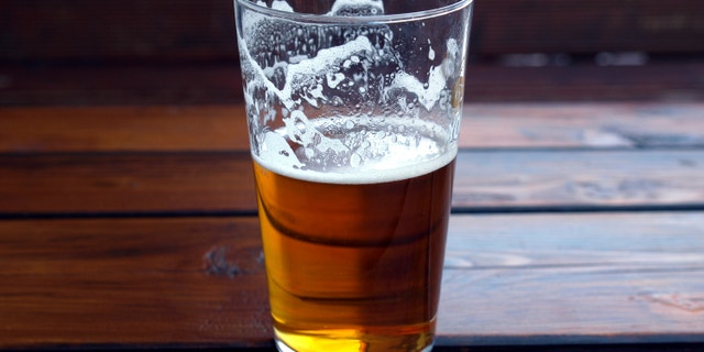 Large glass pint of beer alcoholic drink