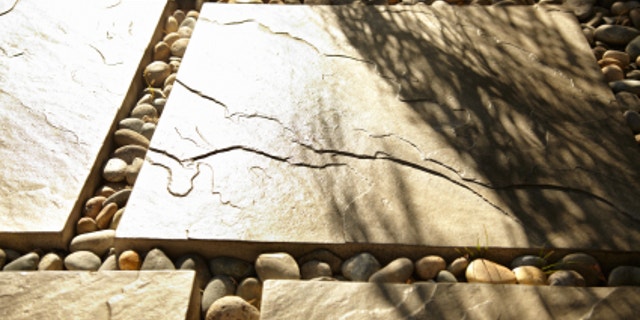A gray slate tile patio.