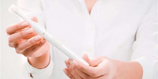 The iBrush 365 toothbrush was designed to help people correct bad brushing techniques.