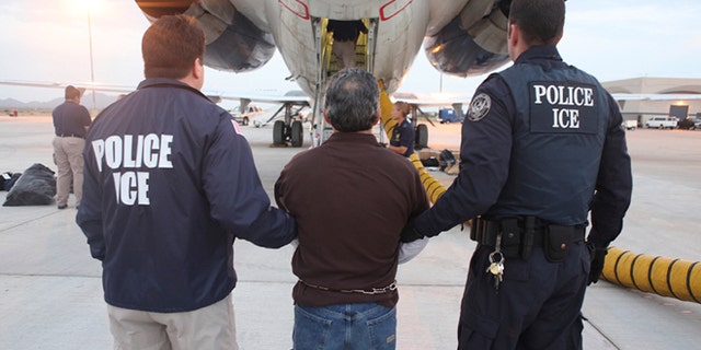 This file photo shows U.S. Immigration and Customs Enforcement (ICE) officials.