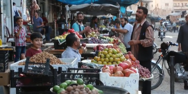 Markets are still open in Idlib, as residents attempt to get on with daily life despite the unknown