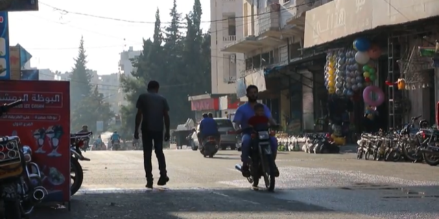 People of Idlib, Syria try to live their normal lives despite a pending offensive.