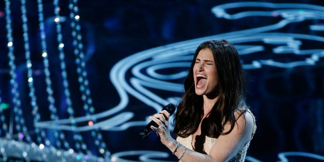 March 2, 2014. Idina Menzel performs nominated original song "Let it Go" by Robert Lopez and Kristen Anderson-Lopez, for the film "Frozen" at the 86th Academy Awards in Hollywood, California.