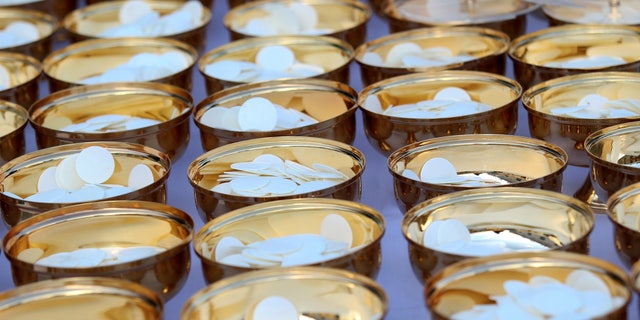 Communion bread are seen before the start of a mass led by Pope Francis to mark the closing of the Catholic Jubilee Year of Mercy at the Vatican November 20, 2016.
