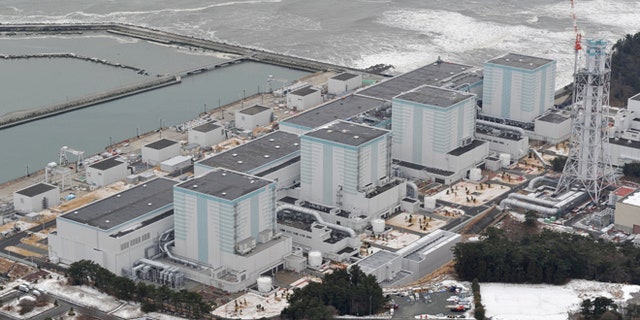 An aerial view shows Tokyo Electric Power Co.'s Fukushima Daini nuclear power plant in Naraha town, Fukushima prefecture, Japan, in this photo taken by Kyodo February 26, 2012.