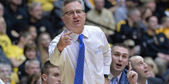 WICHITA, KS - FEBRUARY 11: Head coach Barry Hinson of the Southern Illinois Salukis calls out instructions against the Wichita State Shockers during the first half on February 11, 2014 at Charles Koch Arena in Wichita, Kansas. Wichita State won 78-67. (Photo by Peter Aiken/Getty Images)