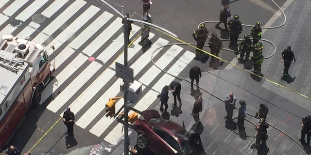 A car plowed into a crowd in Times Square on Thursday.