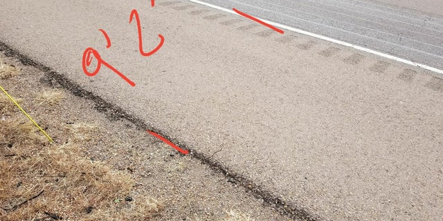 Members of the National Border Patrol Council measured the shoulder area where a tractor trailer would have veered off the roadway and into the agents.