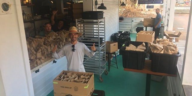 Employees of Longboard, a St. John restaurant, worked with the Red Cross to hand out 1,000 meals per day after Irma.