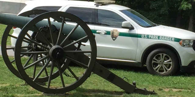 A Civil War canon sits in front of a U.S. Park Ranger vehicle. Security at Gettysburg was ramped up this year after rumors anti-fascist group Antifa would be in attendance.
