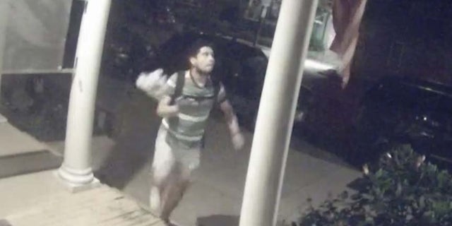 A screenshot of the surveillance video shows the face of the man who burned a flag on the front porch of a Richmond home. (Richmond Police Department)