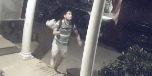 A screenshot of the surveillance video shows the face of the man who burned a flag on the front porch of a Richmond home. (Richmond Police Department)