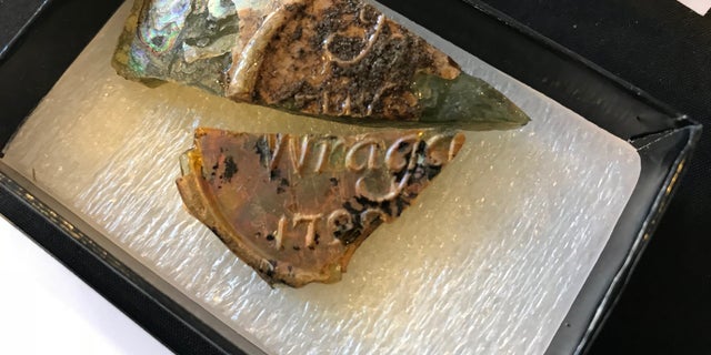 The second half of the wine bottle seal was found in 2002, less than 50 feet away from where the initial piece was discovered nearly 30 years before.