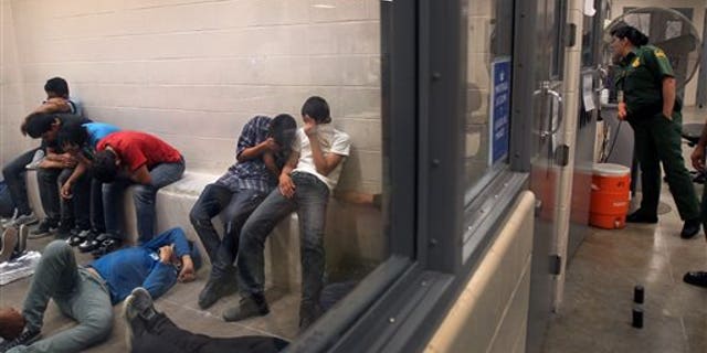 Immigrants who have been caught crossing the border illegally are housed inside the McAllen Border Patrol Station in McAllen, Texas where they are processed.