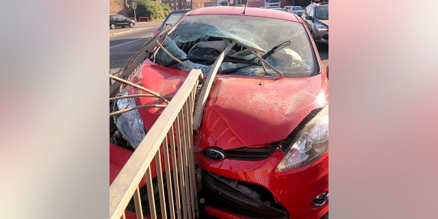 A motorist cheated death after a metal pole pierced his windscreen during a crash - missing his head by inches. See NTI story NTICRASH. The unnamed driver had a miracle escape when he ploughed into metal railings sending a 6ft long metal 'spear' from a barrier smashing through the front window. Shocking pictures show just how close the pole came to hitting the motorist following the horror smash last Tuesday (10/7). Emergency services were called to the scene on John Adams Way, in Boston, Lincs., but the Ford Fiesta driver did not require any medical treatment.