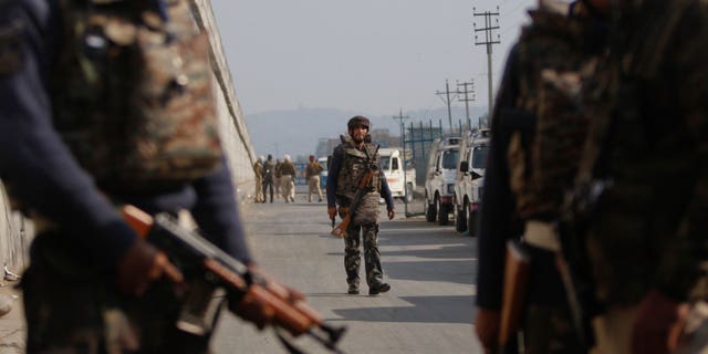 Indian troops patrol outside the Pathankot Air Force Base.