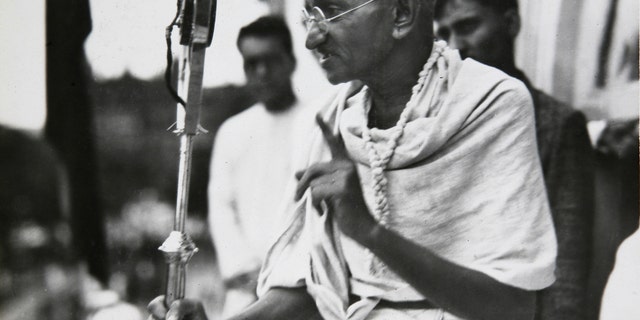 Mahatma Gandhi talks to a crowd in India in 1931.