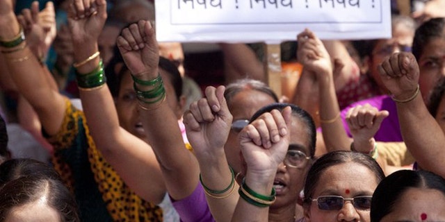 Aug. 24, 2012: Activists with Hindu Awareness Forum shout slogans against the blocking of their web-portal in Mumbai, India. The Indian government's attempts to block social media accounts and websites that it blames for spreading panic have been inept and possibly illegal, a top internet expert said Friday.