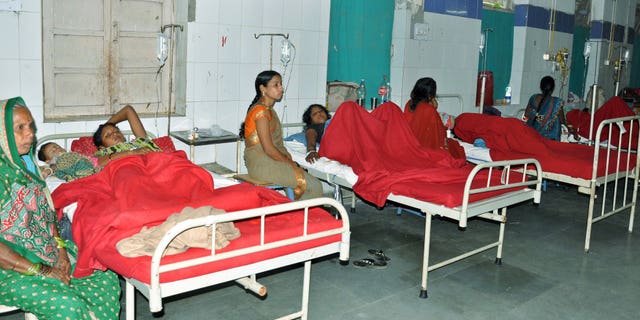 Indian women who underwent sterilization surgeries receive treatment at the CIMS hospital in Bilaspur, in the central Indian state of Chhattisgarh, Tuesday, Nov. 11, 2014. (AP Photo/Press Trust of India)