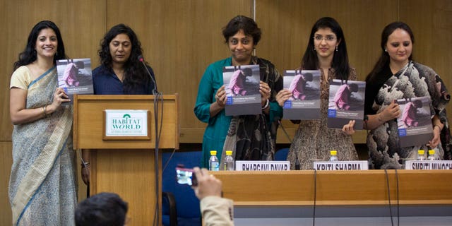 From left to right, Human Rights Watch (HRW) activists Shantha Rau Barriga, Meenakshi Ganguly, Bhargavi Davar from Bapu Trust for Research on Mind and Discourse, HRWs Kriti Sharma, and Smriti Minocha from Human Rights Law Network, release a report titled "Treated Worse than Animals: Abuses against Women and Girls with Psychosocial or Intellectual Disabilities in Institutions in India" in New Delhi, India, Wednesday, Dec. 3, 2014. (AP Photo /Manish Swarup)