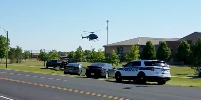 A helicopter lands near Noblesville West Middle School in Indiana.