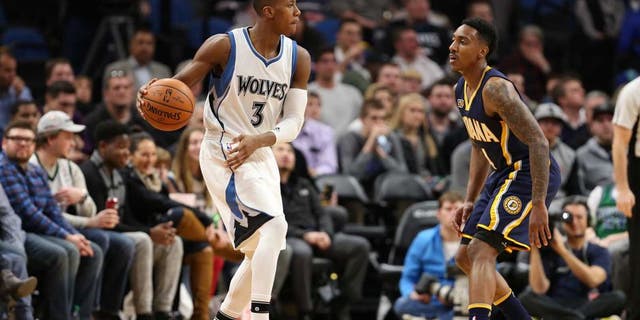 MINNEAPOLIS, MN - JANUARY 26: Kris Dunn #3 of the Minnesota Timberwolves handles the ball against Jeff Teague #44 of the Indiana Pacers during a game on January 26, 2017 at Target Center in Minneapolis, Minnesota. NOTE TO USER: User expressly acknowledges and agrees that, by downloading and/or using this photograph, user is consenting to the terms and conditions of the Getty Images License Agreement. Mandatory Copyright Notice: Copyright 2017 NBAE (Photo by Jordan Johnson/NBAE via Getty Images)