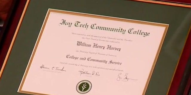 The honorary college degree given to William Henry Harvey as a thank you for his time in the military during World War II.