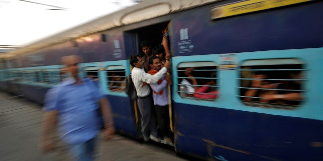 India’s state-run railway has suspended seven workers after a train rolled backwards for seven miles after the brakes failed.