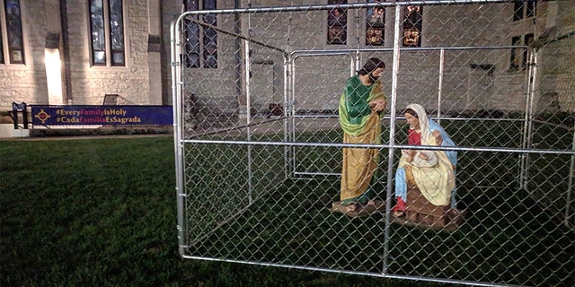 Christ Church Cathedral in Indianapolis placed figures of Joseph, Mary and baby Jesus in an "ICE detention" cage on its front lawn to protest the Trump administration's immigration policies