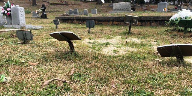80 graves belonging to infants are only marked with small paper and metal signs at West Hill Cemetery.