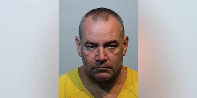 Michael Watters, 48, was arrested Sunday after allegedly stealing identities from several people.