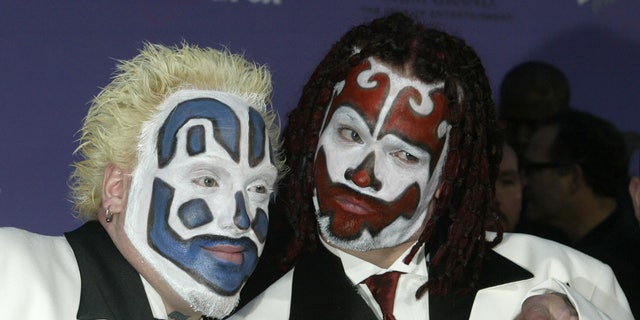 Members of the Insane Clown Posse pose as they arrive at the 2003 Billboard Music Awards at the MGM Grand Garden Arena in Las Vegas, Nevada, Dec. 10, 2003.