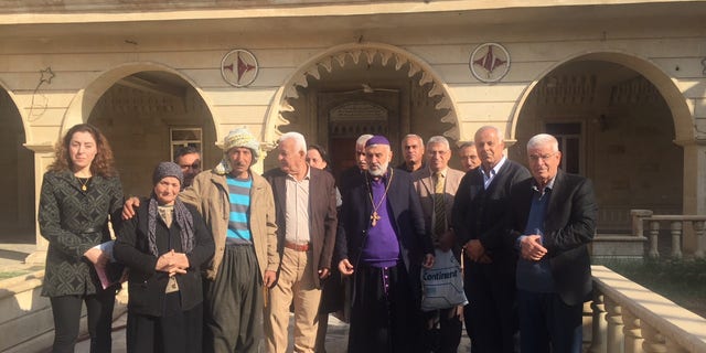 After Sunday Mass in the small Iraqi Christian town of Bahzani.