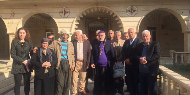 After Sunday Mass in the small Iraqi Christian town of Bahzani.