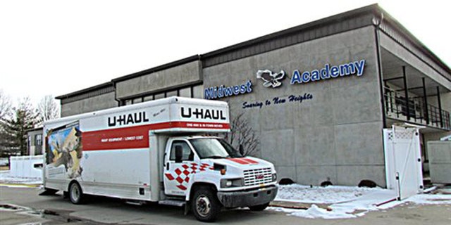 Photo taken Thursday, Feb. 11, 2016, shows a U-Haul outside Midwest Academy in Keokuk, Iowa. (Cindy Iutzi/Daily Gate City via AP)