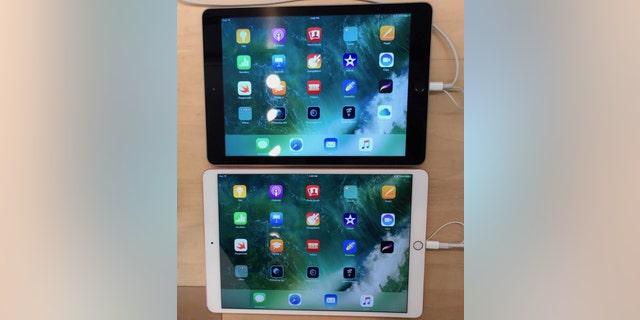 9.7-inch iPad Pro (black, top) and 10.5-inch iPad Pro (white, bottom). (Credit: Brooke Crothers)