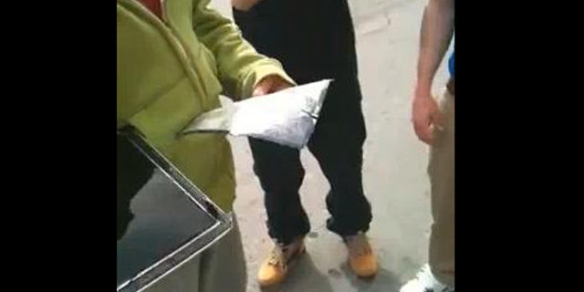 A video of a group of teenagers destroying a brand new iPad computer with a baseball bat has gone viral on YouTube.