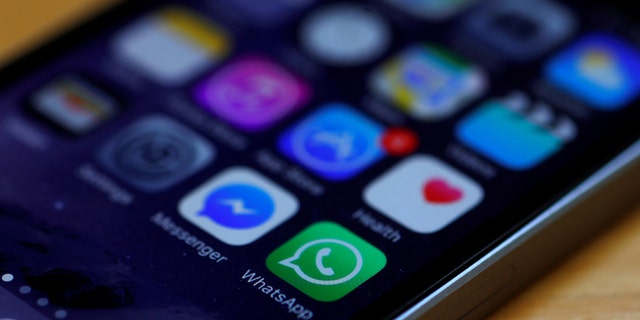 File photo: WhatsApp and Facebook messenger icons are seen on an iPhone.(REUTERS/Phil Noble )