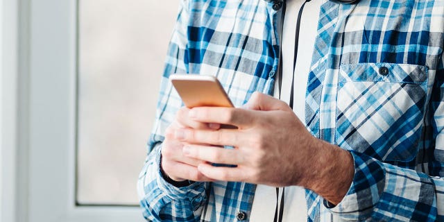 iphone hands istock