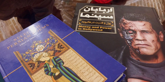 Many tea houses are adorned with small libraries, featuring texts in Persian, English and French