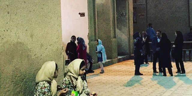 Two young students learning to speak English often frequent Yazd's "Alexander's Prison" eager to meet tourists to help them with their language skills. Built in the 15th century, the "prison" has historically been thought of as a dungeon built by Alexander the Great, although that is largely now considered a myth.