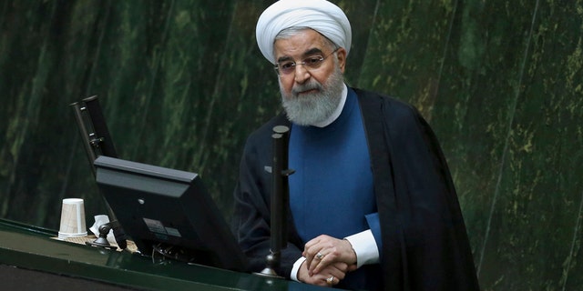 Iranian President Hassan Rouhani speaks in an open session of parliament, in Tehran, Iran, Sunday, Oct. 29, 2017.