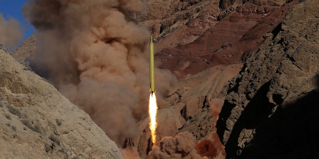 March 9, 2016: In this photo obtained from the Iranian Fars News Agency, a Qadr H long-range ballistic surface-to-surface missile is fired by Iran's powerful Revolutionary Guard, during a maneuver, in an undisclosed location in Iran.