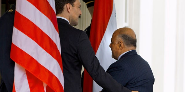April 14, 2015: Iraqi Prime Minister Haider Al-Abadi is welcomed into the West Wing of the White House in Washington.