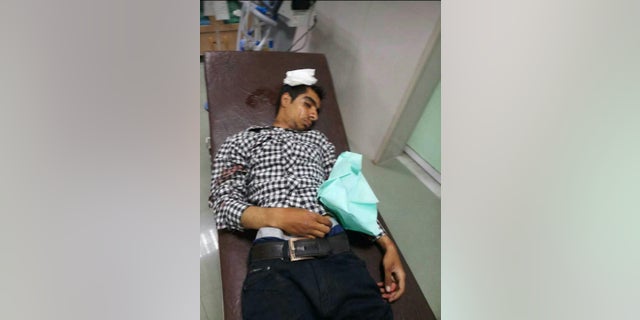 A protester who was apparently injured in in the southern Iranian city of Kazerun