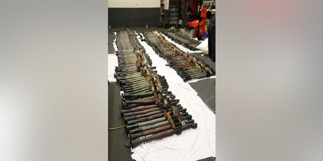 A cache of Iranian weapons seized in the Arabian Sea, assembled on the deck of the guided-missile destroyer USS Gravely.
