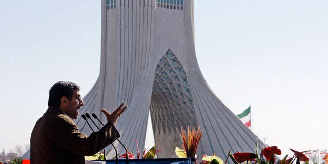 Feb. 11, 2012: Iranian President Mahmoud Ahmadinejad gestures as he deliver his speech near the Azadi (freedom) tower at a rally to mark the 33rd anniversary of the Islamic Revolution that toppled the country's pro-Western monarchy and brought Islamic clerics to power, Tehran.